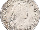 a close up of a coin on a white background