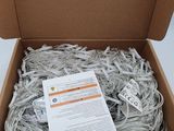 a box of shredded shredded paper sitting on top of a table