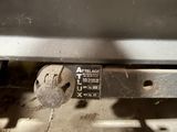 a close up of a metal object on the ground