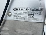 a close up of a metal object with a sticker on it