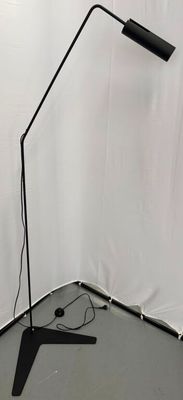 black metal floor lamp with a black base and a black shade