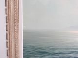 a picture of a picture of a body of water in a picture frame