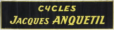 a black and yellow sign that says cycles jacques anquetti