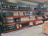 many boxes of tires on the shelves in the warehouse