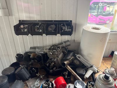 a pile of assorted items sitting on a table