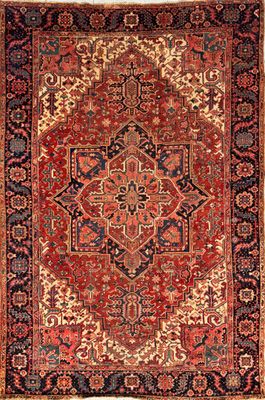 an antique persian rug with a red and blue design