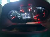 a car dashboard with a speedometer and gauges on it