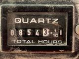 a close up of a clock on the side of a building