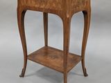 an image of a small wooden table with a shelf underneath it