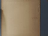 a piece of paper on a table next to a pair of scissors and a pair of scissors