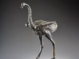 bronze sculpture of an ostrich standing on a marble base