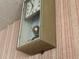 a clock that is hanging on the wall in the room