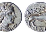 a close up of a coin with an image of a man on it