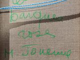 a message written on a piece of burlock paper on a clothes line