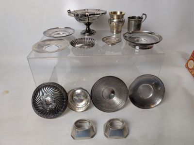 a lot of silver items sitting on a table