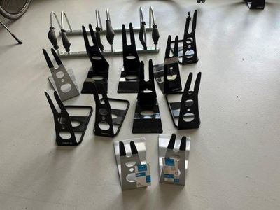 a lot of tools that are laying out on the floor