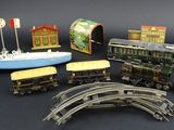 a lot of toy trains that are sitting on a table