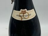 a bottle of wine that is sitting on a table