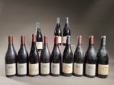 six bottles of wine are lined up in a row on a table