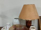 a small table with a lamp on top of it