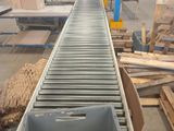 a picture of a conveyor belt in a warehouse