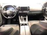 a picture of a car dashboard with a steering control