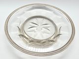 a clear glass plate with a fish design on it