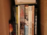 a box full of books that are sitting on a table
