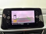 a picture of a car ' s dashboard with a camera attached to it