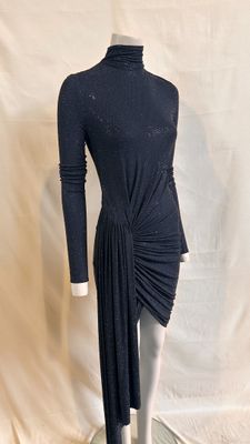 the mannequin is wearing a black dress with a high neck
