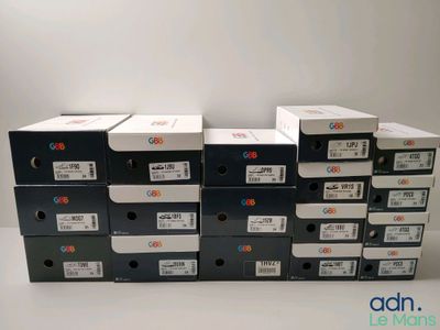 several boxes are stacked on top of each other on a table
