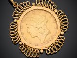 a gold coin pendant with an image of a woman in profile