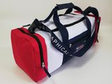 sac de voyage avec des bordures rouges, blanches et bleues