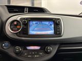 a picture of a car dashboard with a game on the screen