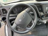 dashboard view of a car with a steering wheel and dashboard controls