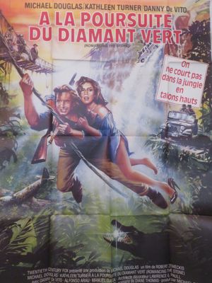 une affiche de film racontant les aventures d'une femme et d'un homme dans la jungle