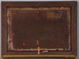 an old wooden box with a cross on the bottom