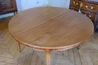 Table de salle à manger de forme ovale en acajou reposant su… (photo 3)
