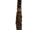 an image of a wooden stick with a carved design on it