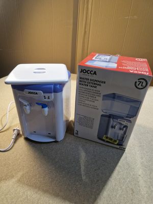 a box of water dispenser next to a box of water