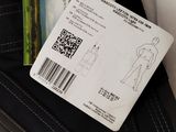 a picture of a person ' s wallet with a credit card in it