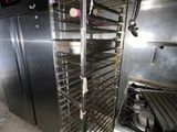 an image of a commercial kitchen with stainless steel appliances