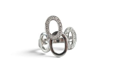 a close up of a ring on a white background
