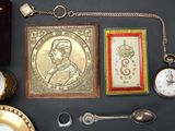a picture of a collection of antique items on a table