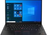a laptop with a windows 10 screen and keyboard on top of it