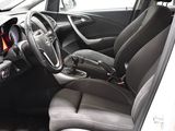 the interior of a car with a steering wheel and a dashboard