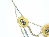 a picture of a necklace that has a picture of a woman on it