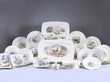 un grand ensemble d'assiettes, de tasses et de soucoupes en porcelaine