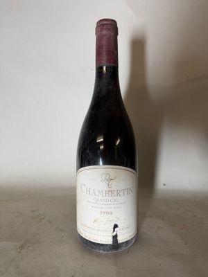 a bottle of wine that is sitting on a table