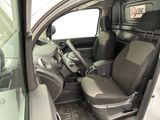 the interior of a car with the door open and the driver ' s seat up
